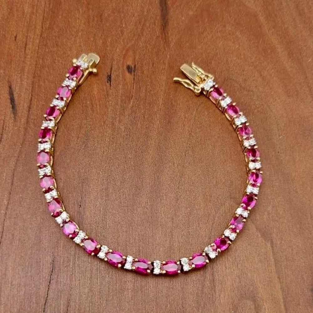 Stampd Gold Bracelet with Pink Stones and Clear Accents